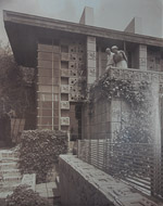 A historic photo of the Freeman House with Samuel & Harriet Freeman on the patio Wrightway-CA-9866.jpg