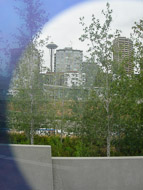 A view of the Space Needle through the 'Seattle Cloud Cover' sculpture Seattle-2217.jpg
