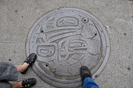 A 'foot shot' at a Seattle man hole cover Seattle-2106.jpg