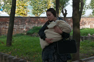 A young mother with her baby leaving the monastery, possibly after receiving a blessing with the holy water of St. Sergius' well. _DSC0705.jpg